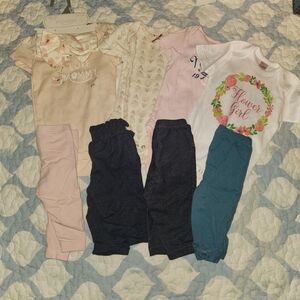 3-6 months clothing 4 oncies and 4 pairs of pants